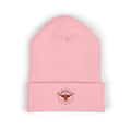 Pink beanie with a logo on a white background