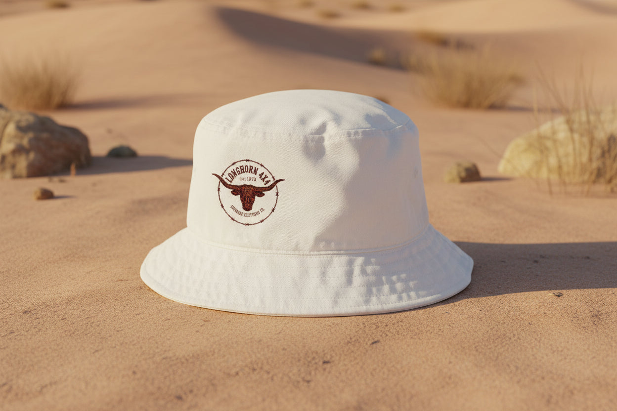 White bucket hat with a logo on a beach background